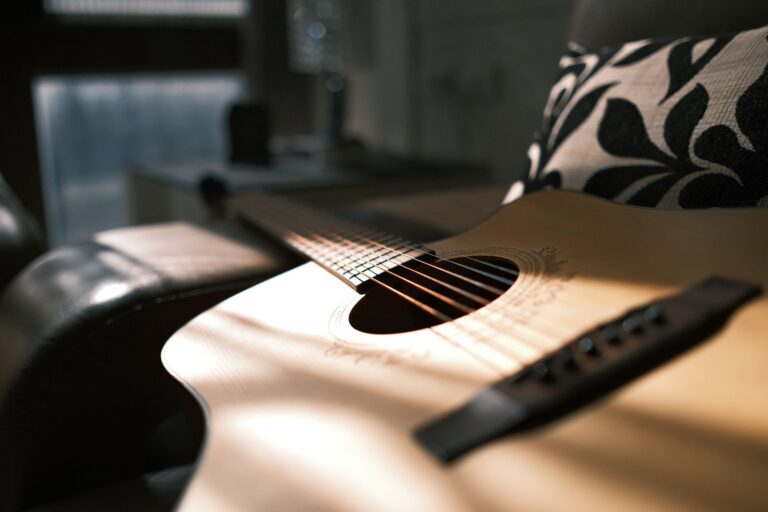 Acoustic guitar in warm indoor light